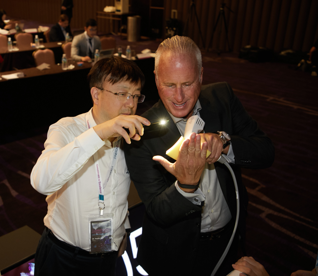 Ross Portaro, Global Vice President of Surgical Aesthetics demonstrating use of the Profound handpiece and needle insertion into skin tissue.